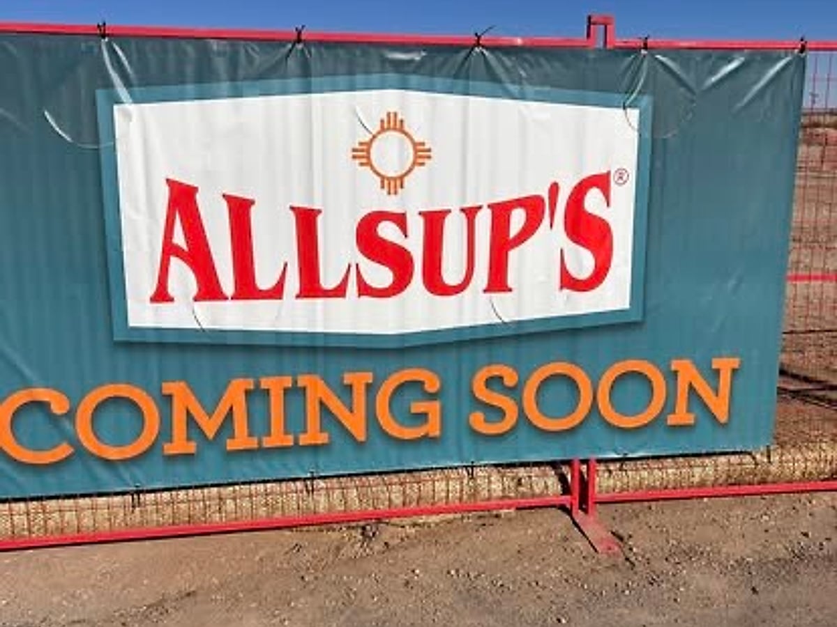 Allsup's Coming Soon banner at a graded commercial site in Willcox, Arizona